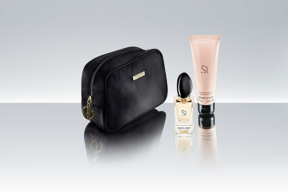The Giorgio Armani business class amenities kit contains perfume and lotion—men get one set, women get another.