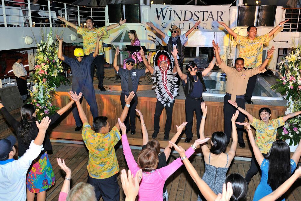 The Village People (a.k.a. the Star Breeze crew) performs YMCA at the deck barbeque.