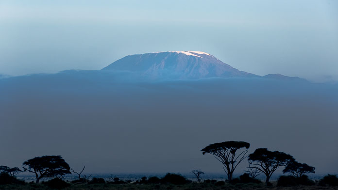 The summit of Kilimanjaro in Tanzania as seen from Amboseli, Kenya. Photo by Susan Portnoy