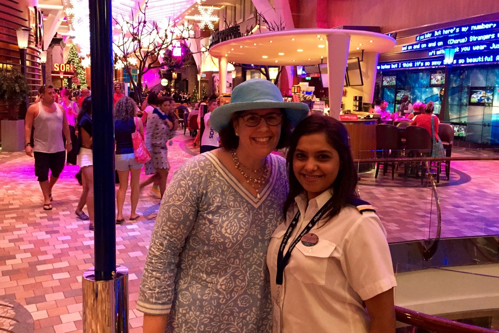My genie, Smitha Thompson, and me in the Royal Promenade aboard Allure of the Seas.