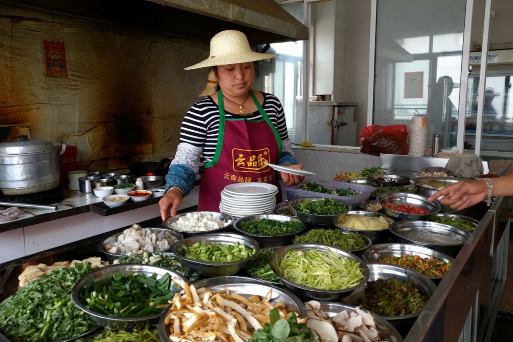 Dali Yunnan China local lunch woman cooking
