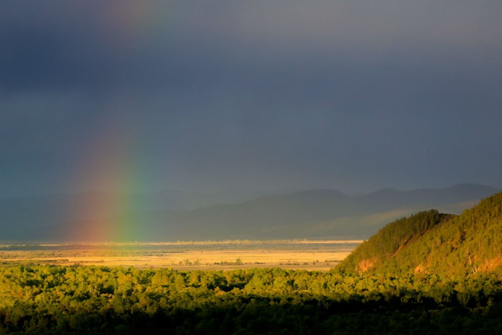 Mongolia's landscape with a rainbow. Photo: Nomadic Expeditions