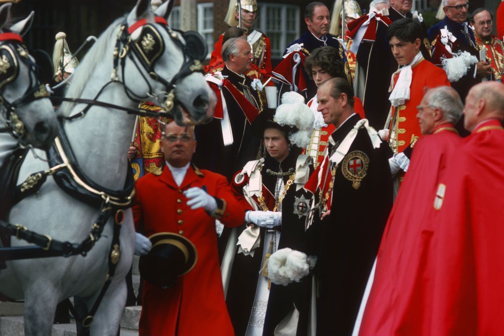 Queen Elizabeth II at the Garter Ceremony with Lord Chamberlain in 1976, Windsor Castle, Berkshire, England, UK. Photo: Visit Britain
