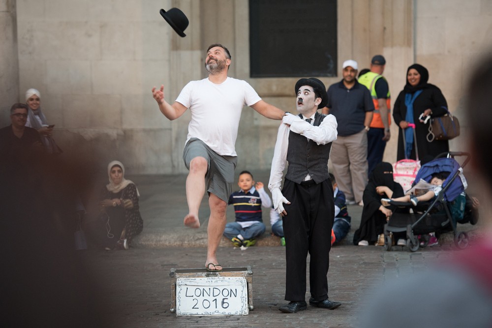A Charlie Chaplin impersonator at Covent Garden.