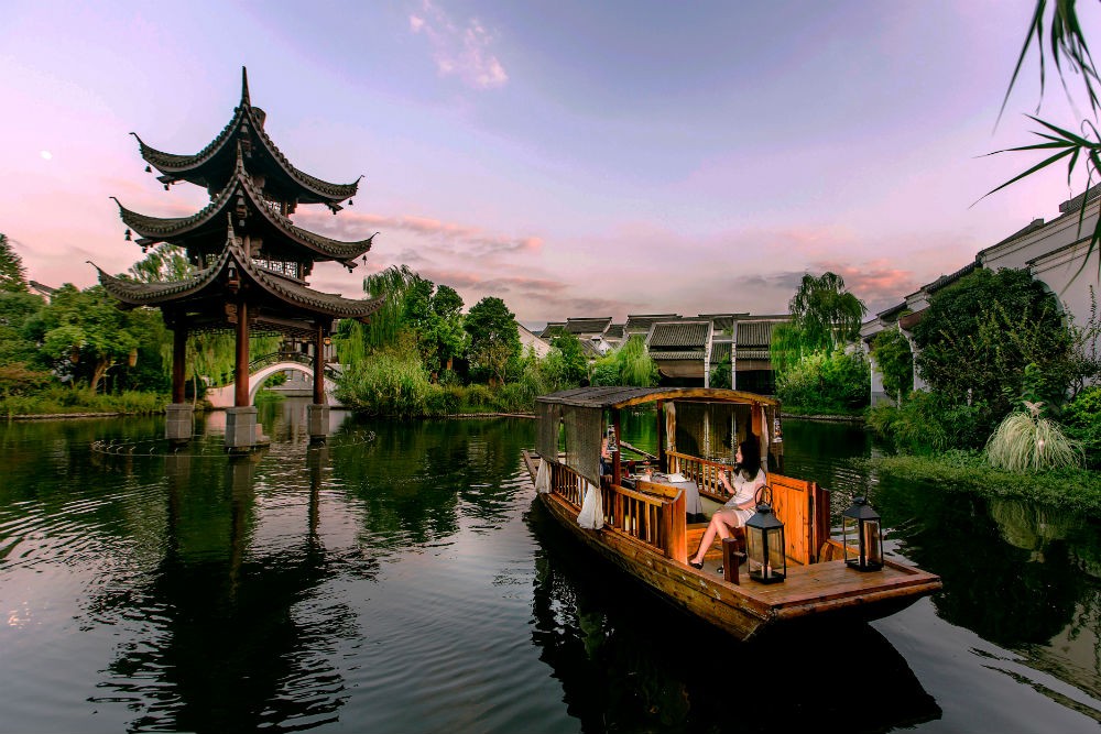 Hangzhou west lake with Banyan tree and boat