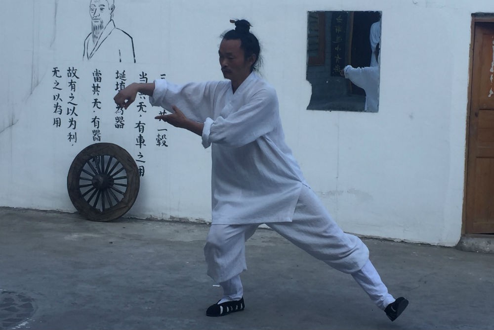 A Taoist priest performs tai chi in China’s Wudang mountain range, the birthplace of the martial ar