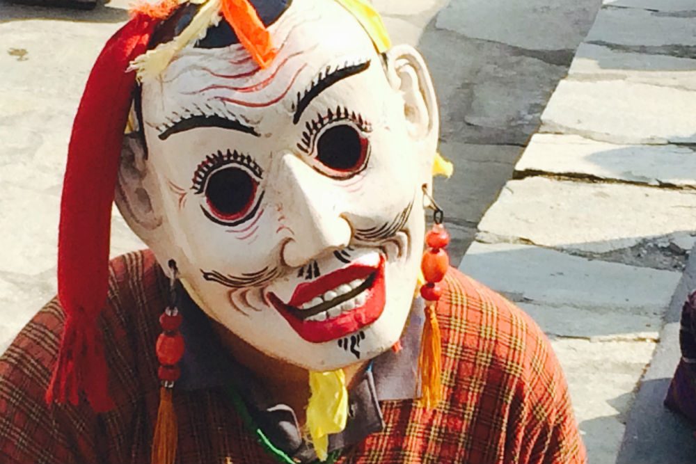 person in mask at Bhutan’s annual Gomphu Kora Festival 