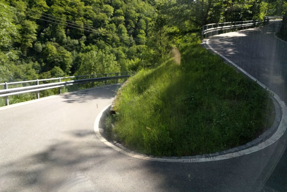 Hairpin turn on road in Ticino Switzerland