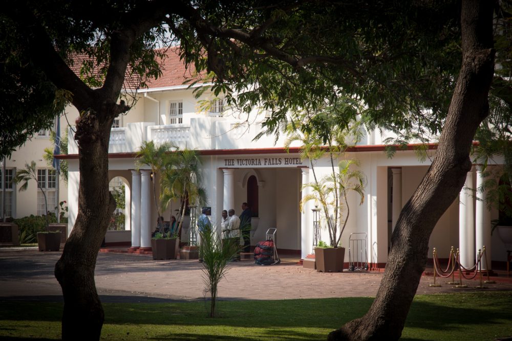Entering the Victoria Falls Hotel is like walking back in time.