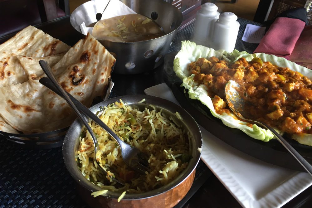 biryani and curry and naan in India