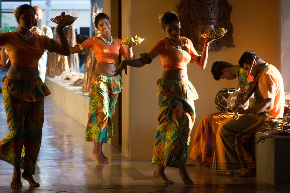 Clue #3: When guests arrive, they’re welcomed with a dance. (For the music and movement, see the first video below.)