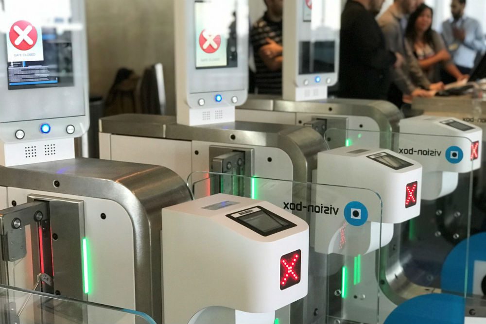 britishairways biometric boarding gates LAX