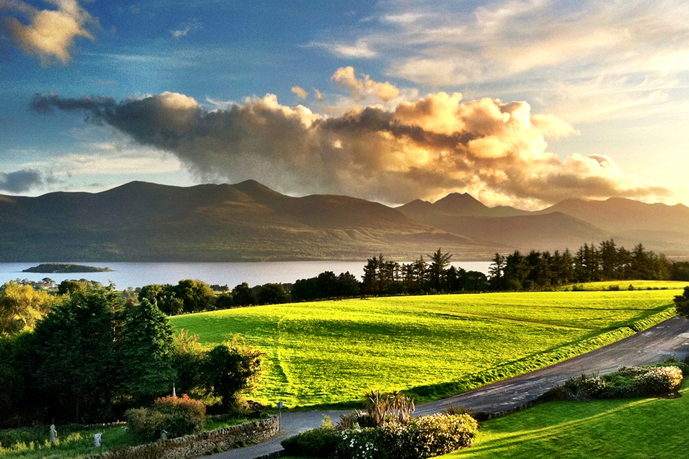 landscape view of green fields in Ring of Kerry, Killarney, Ireland