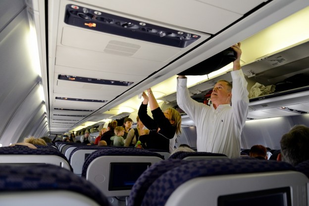 Overhead bins, carry-on luggage