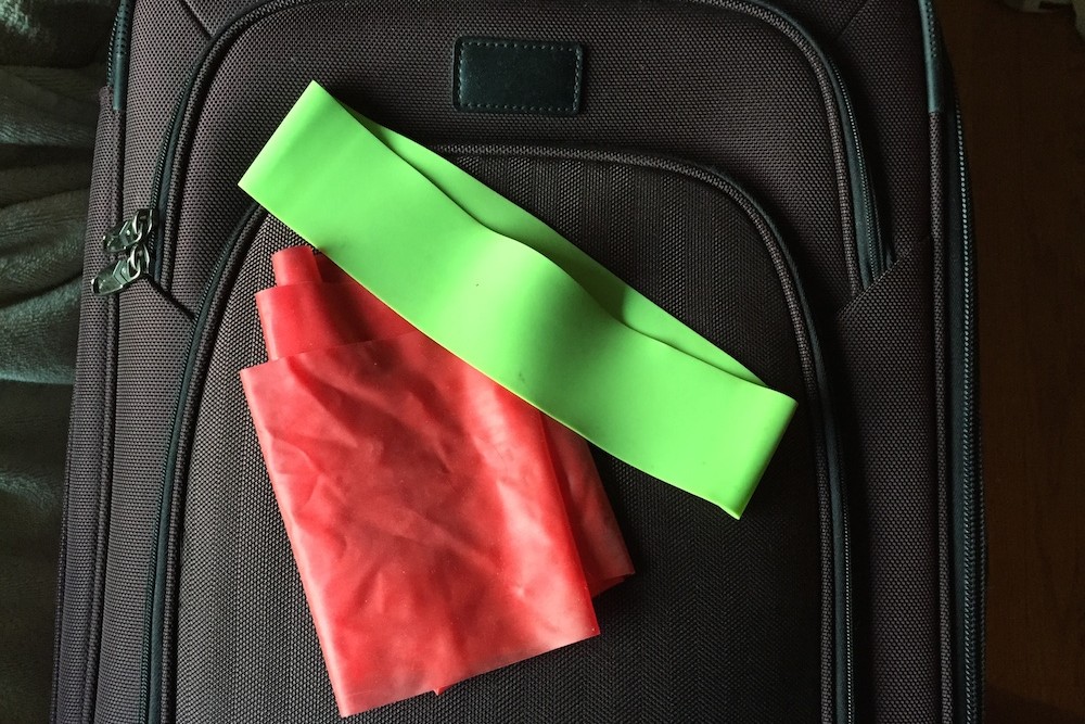 exercise bands on carry-on bag