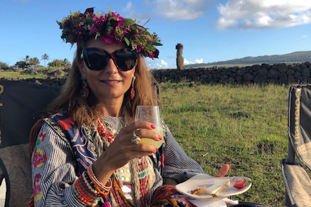 woman toasting with wine on Easter Island