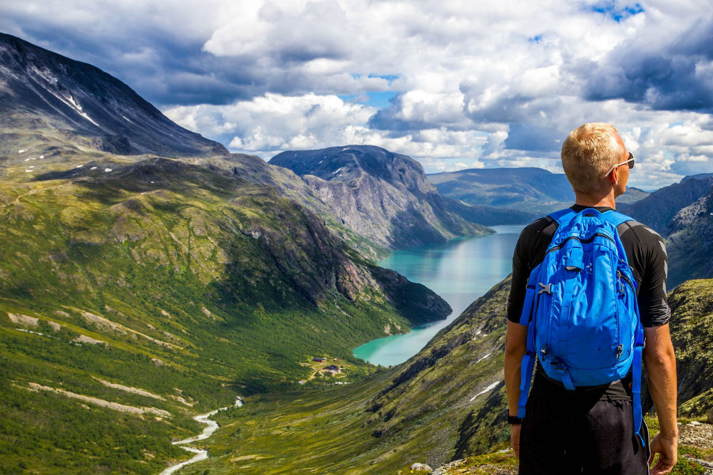 person standing on a mountain in Norway