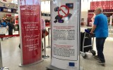 Signage about the electronics ban at the Air Maroc check-in desk