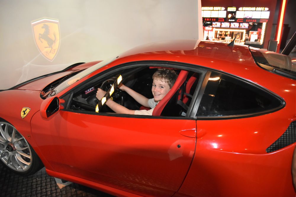 child in car at Ferrari World theme park in Abu Dhabi