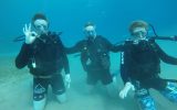 Wendy’s husband, Tim, diving with their sons, Charlie and Doug, in the Red Sea.