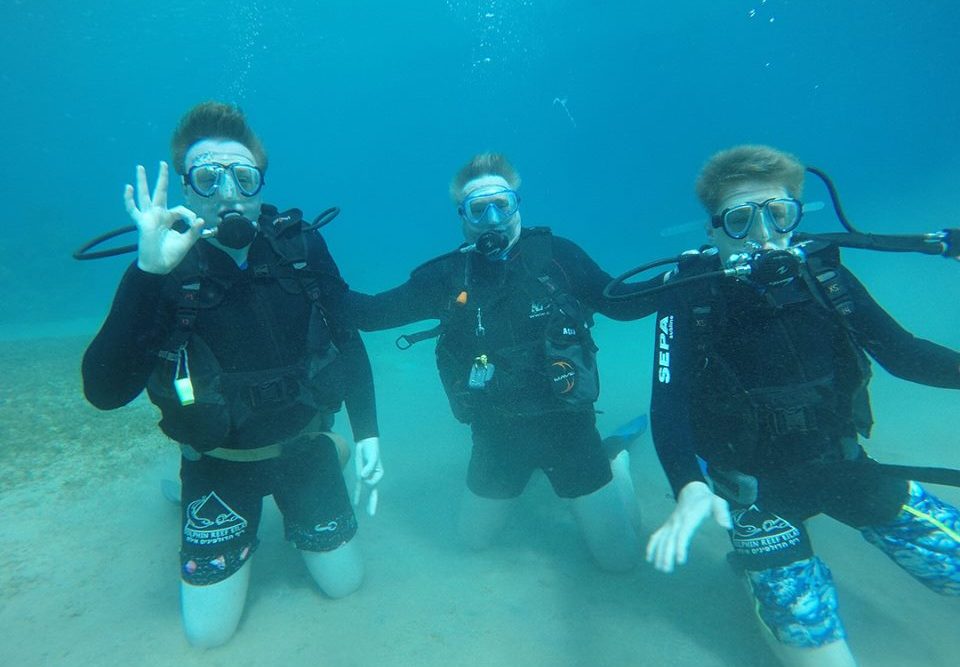 Wendy’s husband, Tim, diving with their sons, Charlie and Doug, in the Red Sea.