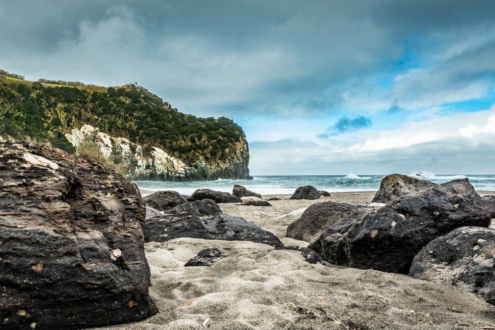 rocky beach and ocean ofPraia dos Moinhos at Porto Formoso on the island of Sao Miguel in the Azores Portugal