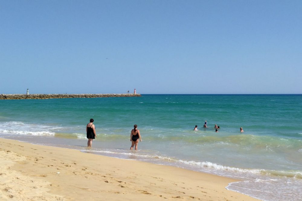 beach with turquoise water in the Algarve Portugal