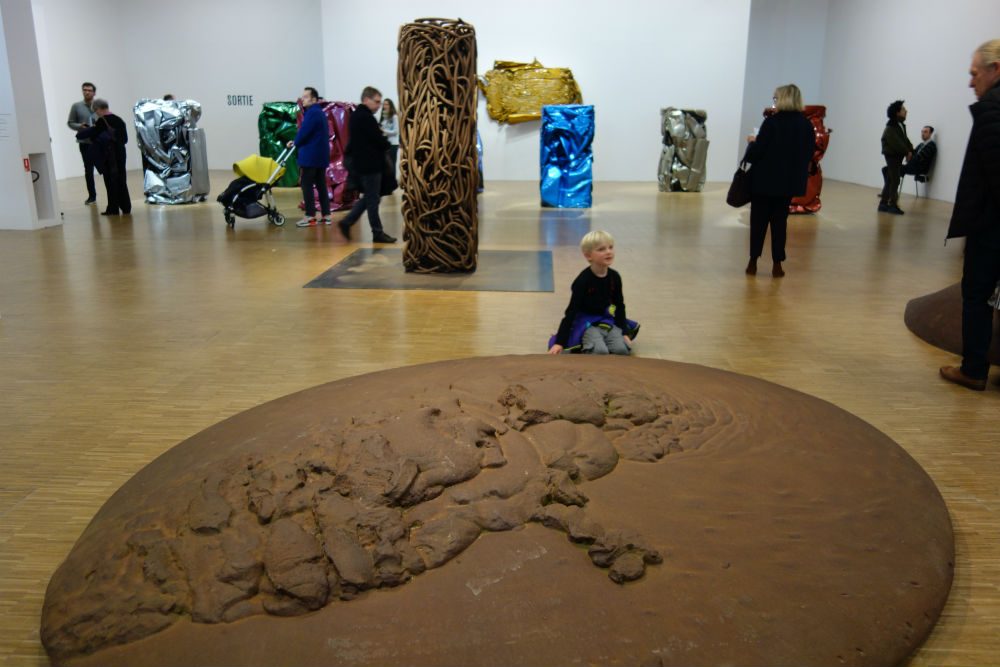 child looking at art at the Centre Pompidou in Paris