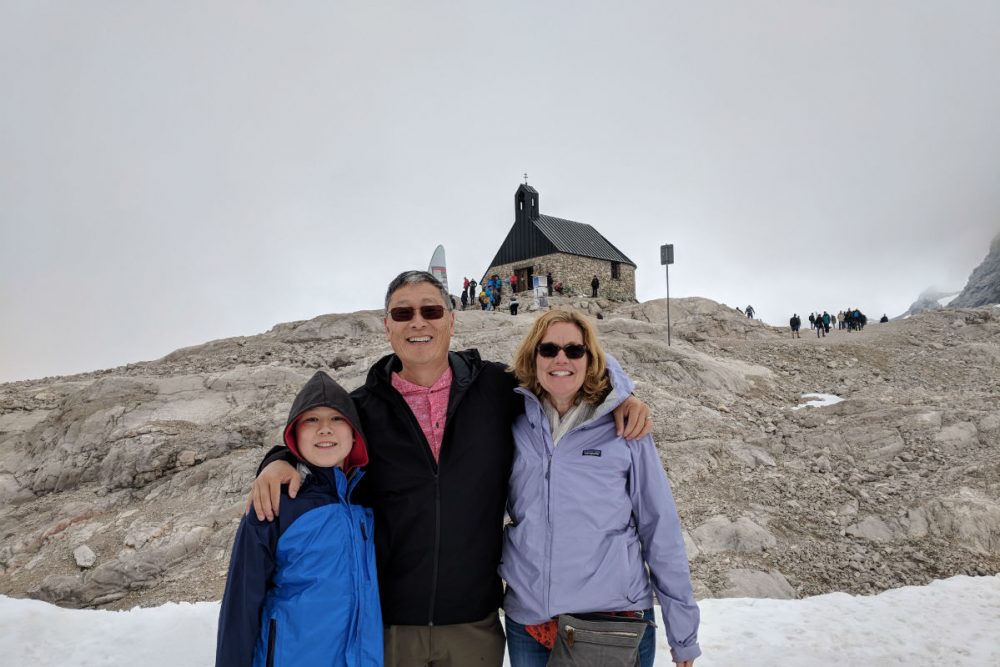 tourist family in Bavaria at top of mountain