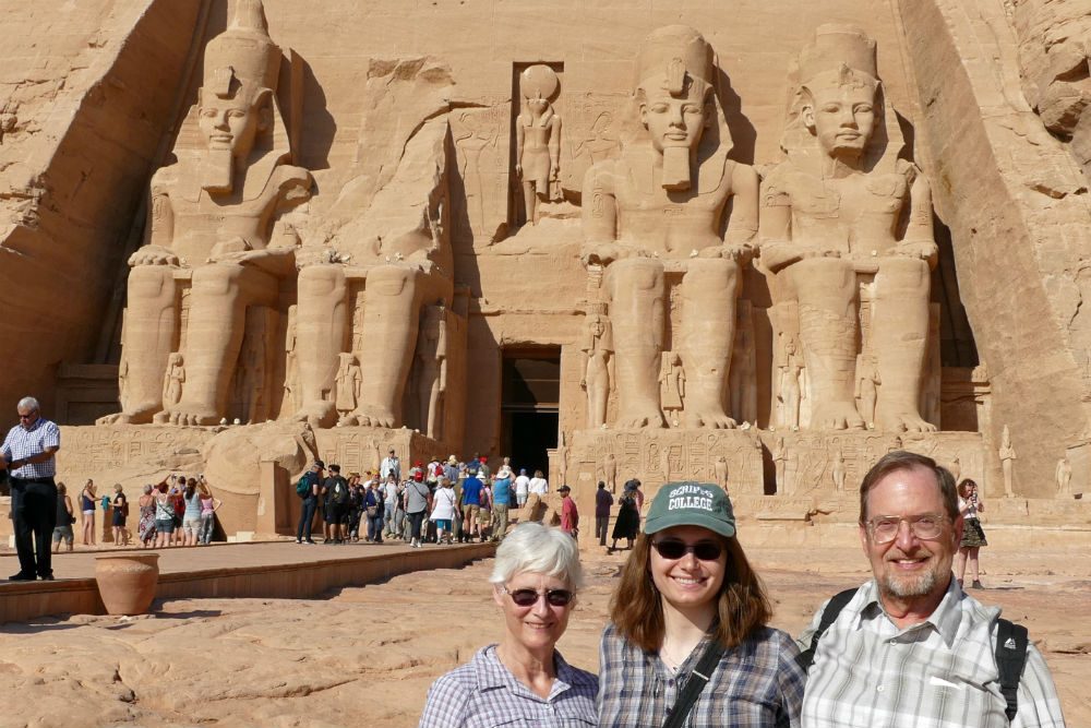 tourists in front of the 108-foot-high facade of Abu Simbel Egypt