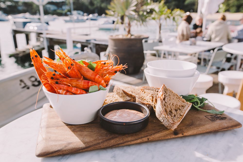bucket of prawns lunch meal at Boathouse Balmoral Beach Sydney Australia