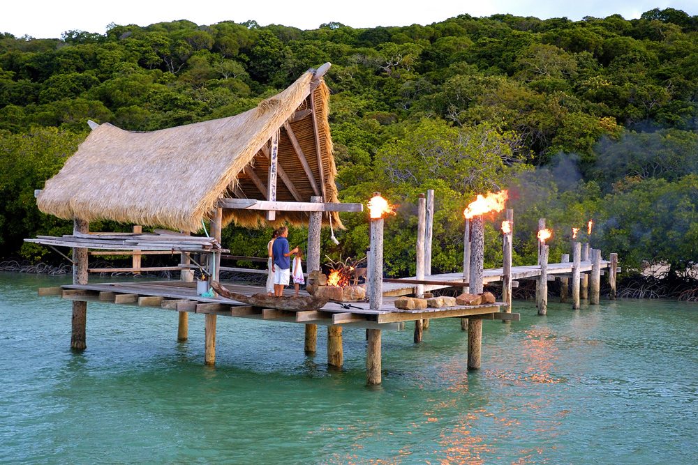 rustic beach bungalow overwater suite at Haggerstone Island resort at the Great Barrier Reef in Australia