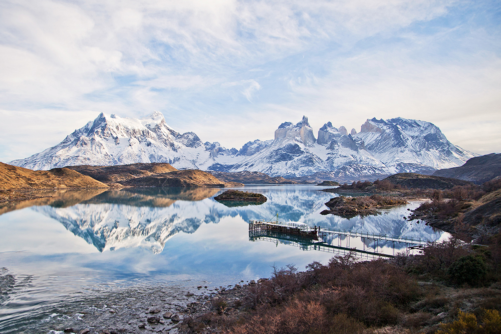 snowy landscape of mountains and lake in Torres Del Paine National Park Chile
