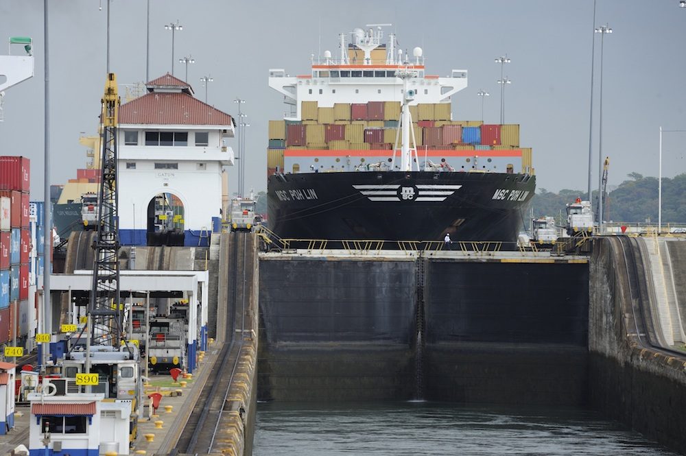 container ship passing through Panama Canal Gatun Lock