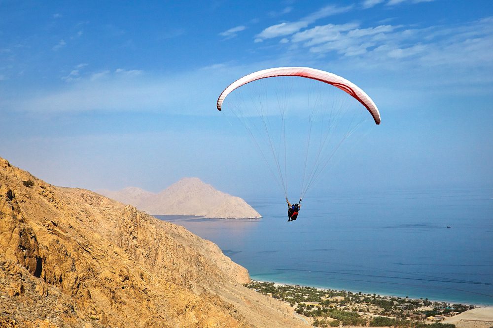 Paragliding into Six Senses Zighy Bay, Oman