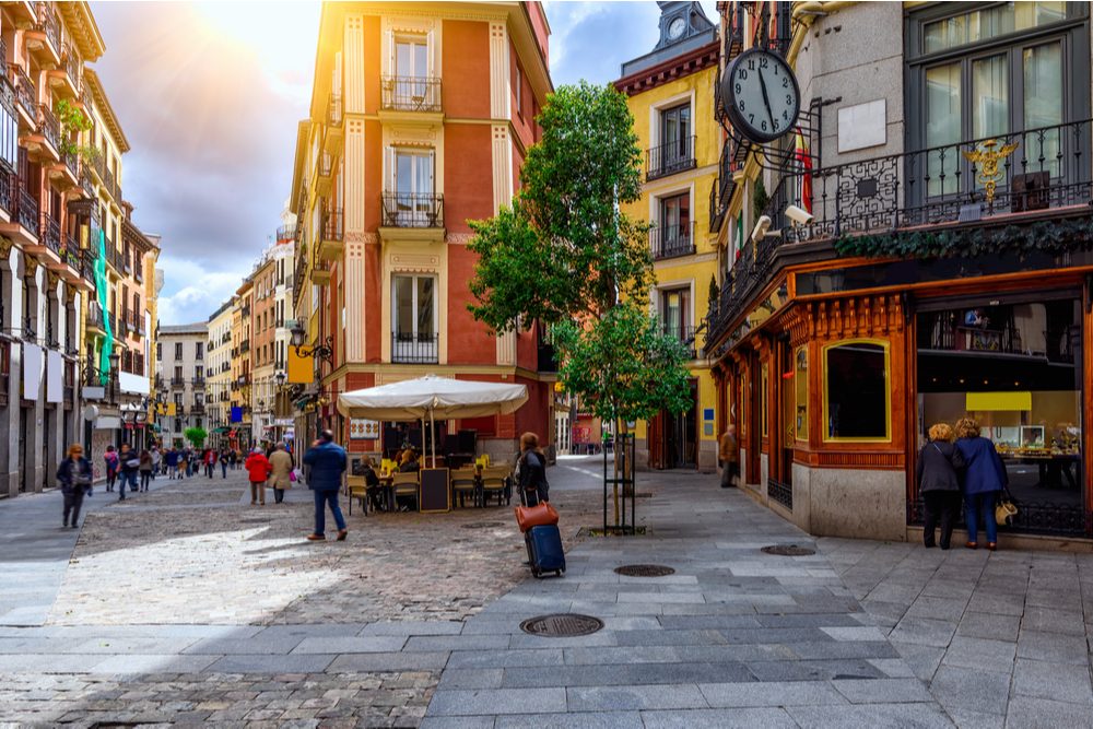 Old cozy street in Madrid, Spain. Architecture and landmark of Madrid, postcard of Madrid