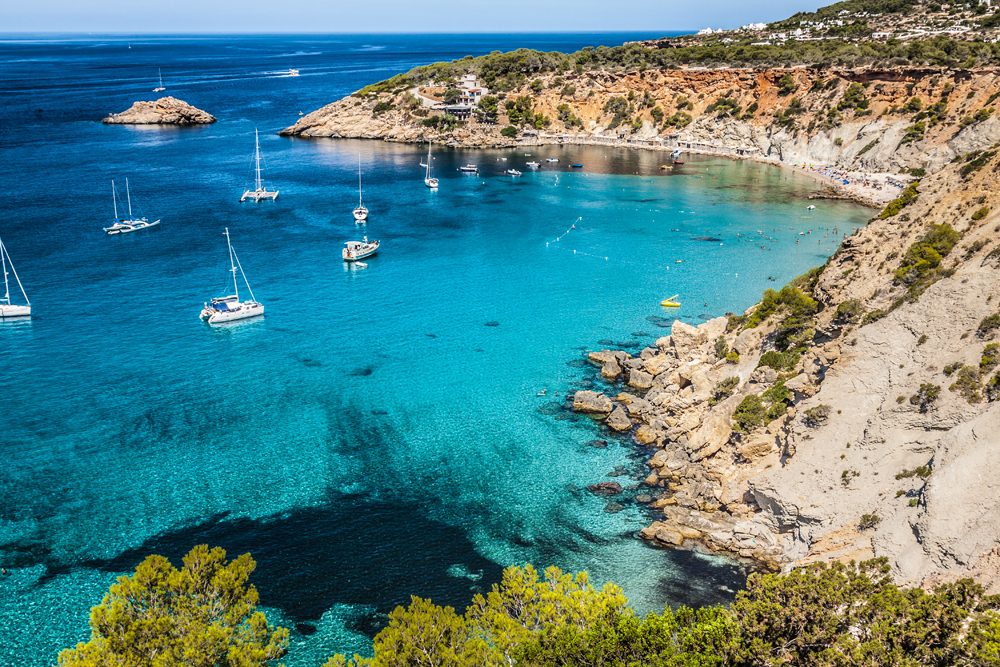 Bay with sailboats in Cala d Hort IBIZA Spain