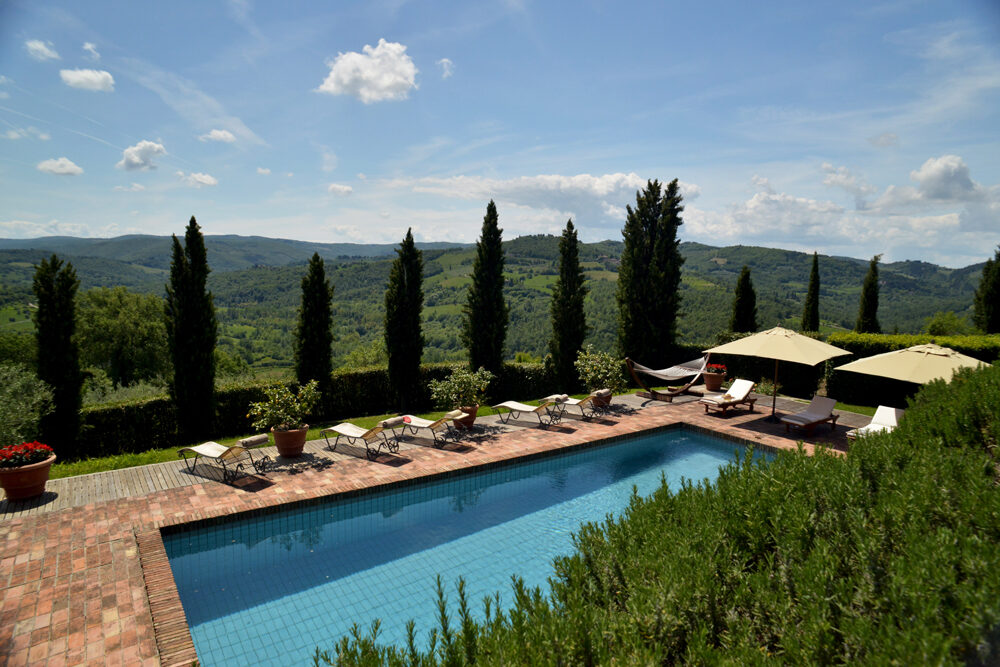 Poolside and deck view. Ca di Pesa Italy villa