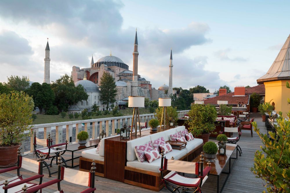 garden restaurant at Four Seasons Sultanahmet Istanbul Turkey overlooking mosque