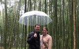 couple the bamboo forest Kyoto Japan with umbrella