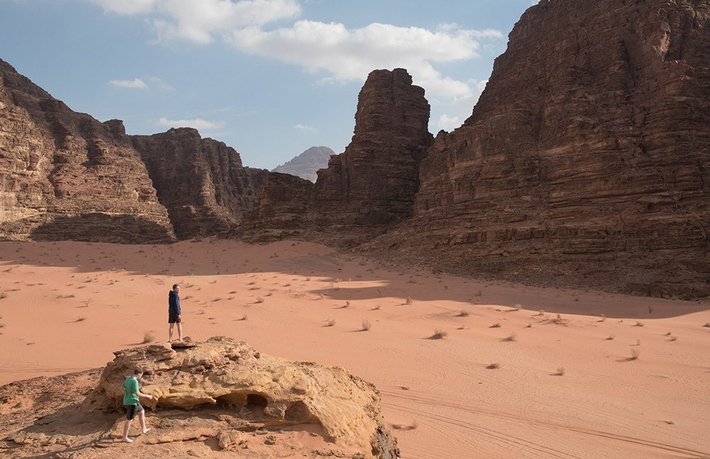 Wad Rum desert in Jordan with orange sand and large rock towers