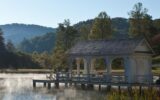 covered gazebo dock stretching into lake in tennessee at Blackberry Farm resort