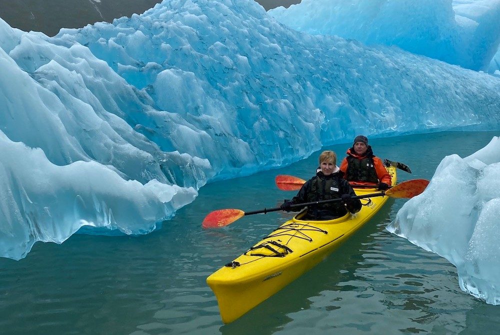 a couple kayaks through the ice in Alaska