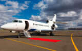 private jet with red carpet