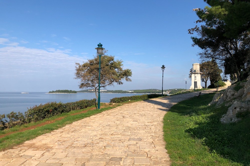 stone pathway by the water in Rovinj Croatia Istrian peninsual