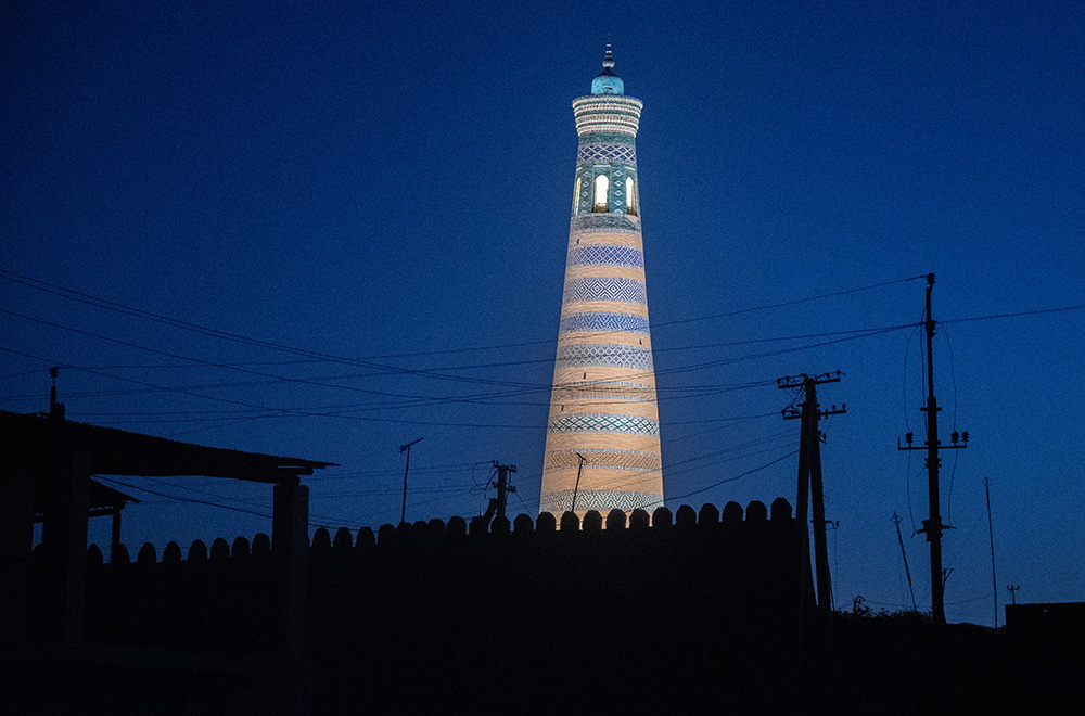 minaret inside the city walls of Khiva at the Islam-Khodja complex Uzbekistan