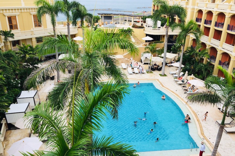 View of pool area from Luxury Room at Sofitel Legend Santa Clara