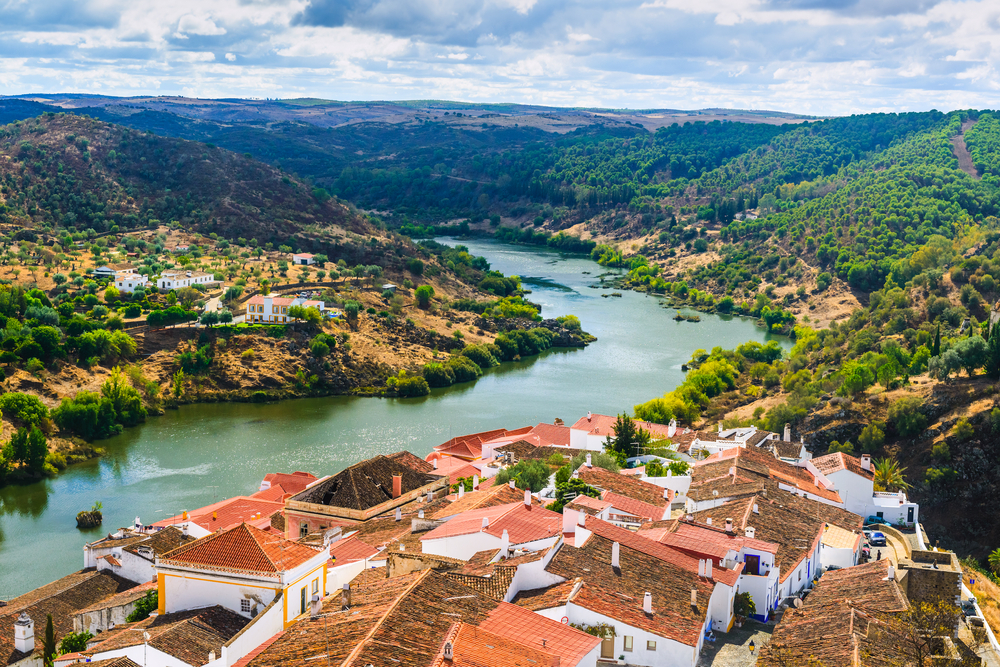 The river Guadiana and the village of Mertola. Alentejo Region. Portugal