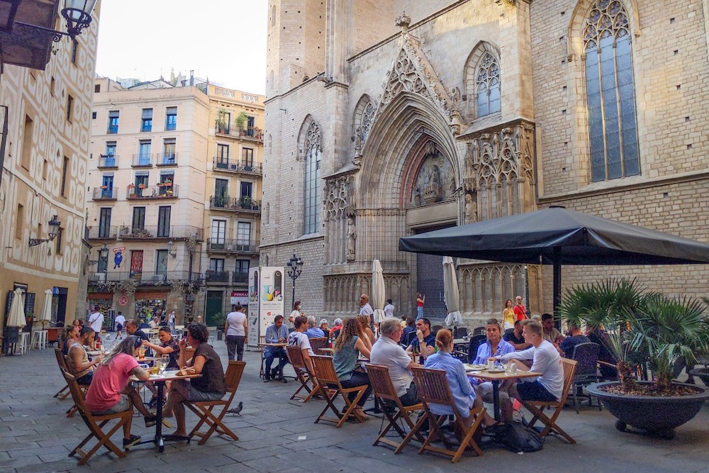 people eating outside of vBasilica of Santa Maria del Mar in Barcelona Spain