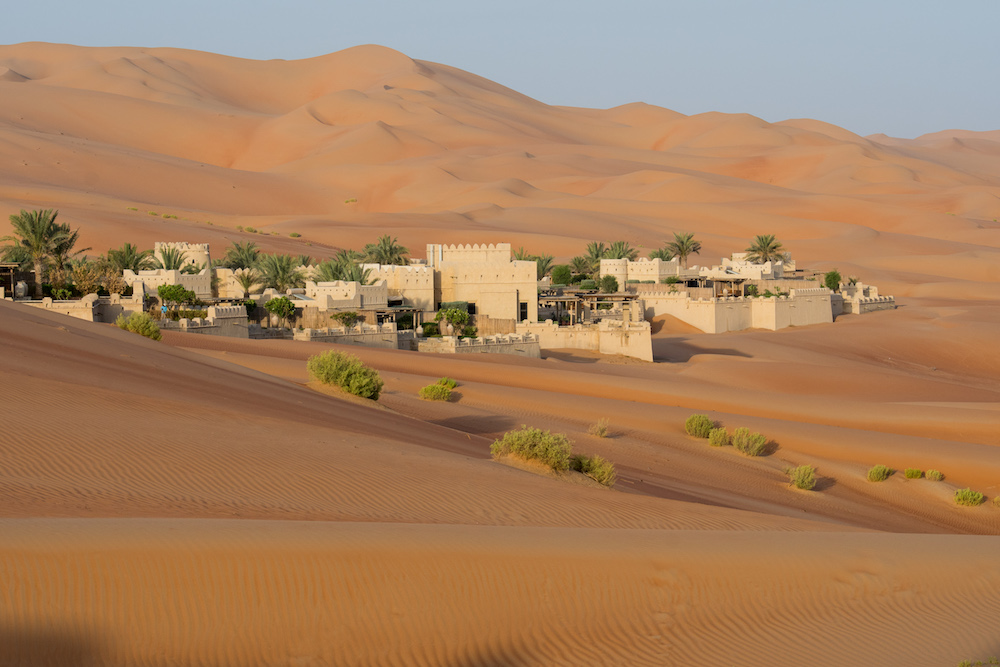 white buildings of Qasr al Sarab resort in Abu Dhabi desert